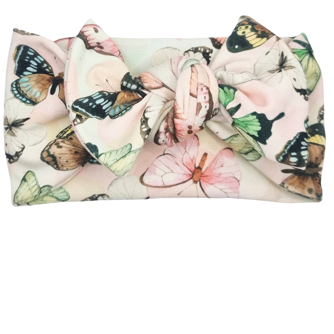 Opaska szeroka z kokardą ecru w kolorowe motylki